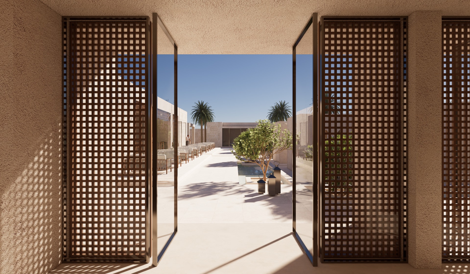 Bronze mashrabiya screens opening onto a water channel and courtyard
